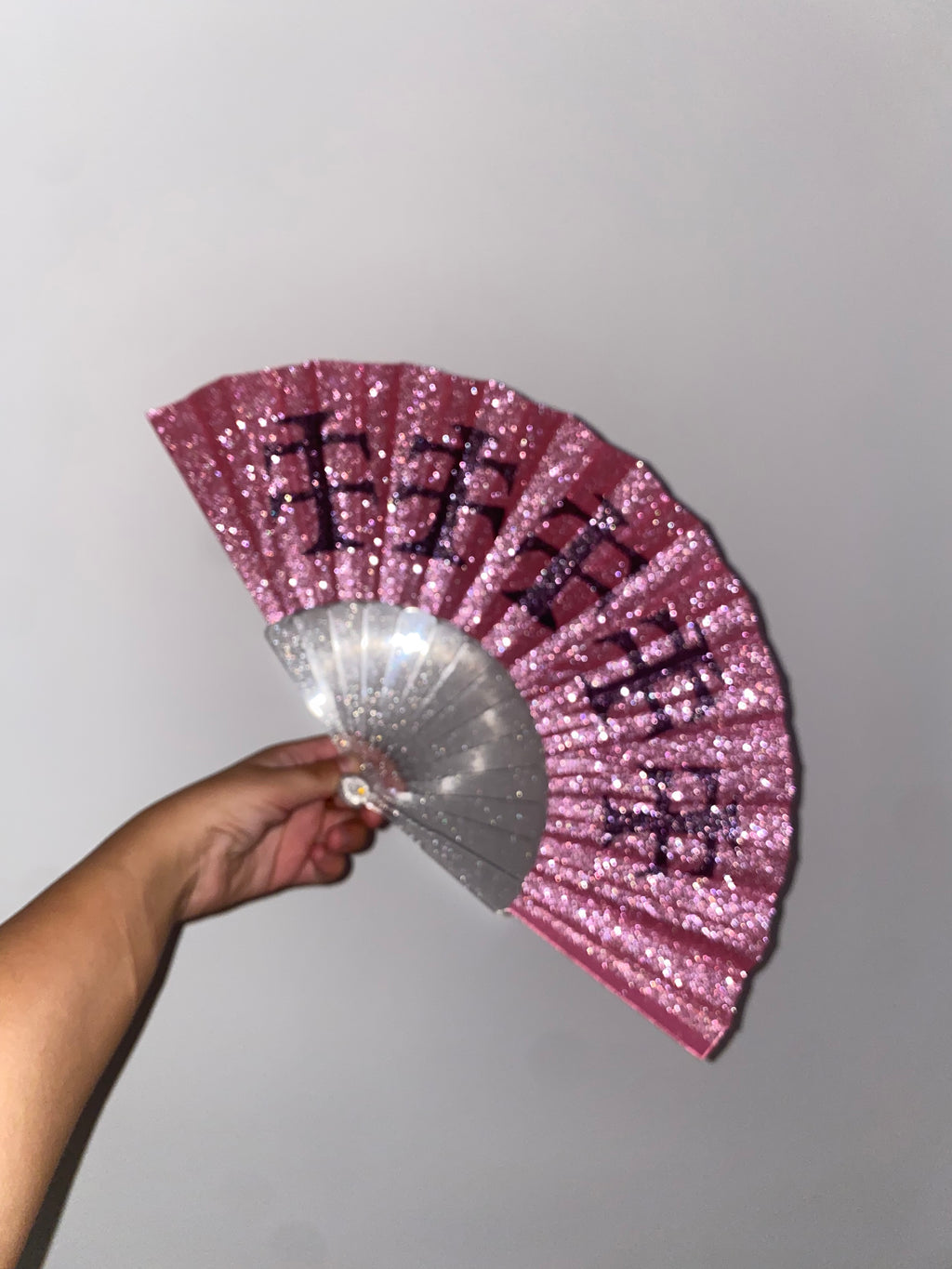 Pink glitter fan black cross