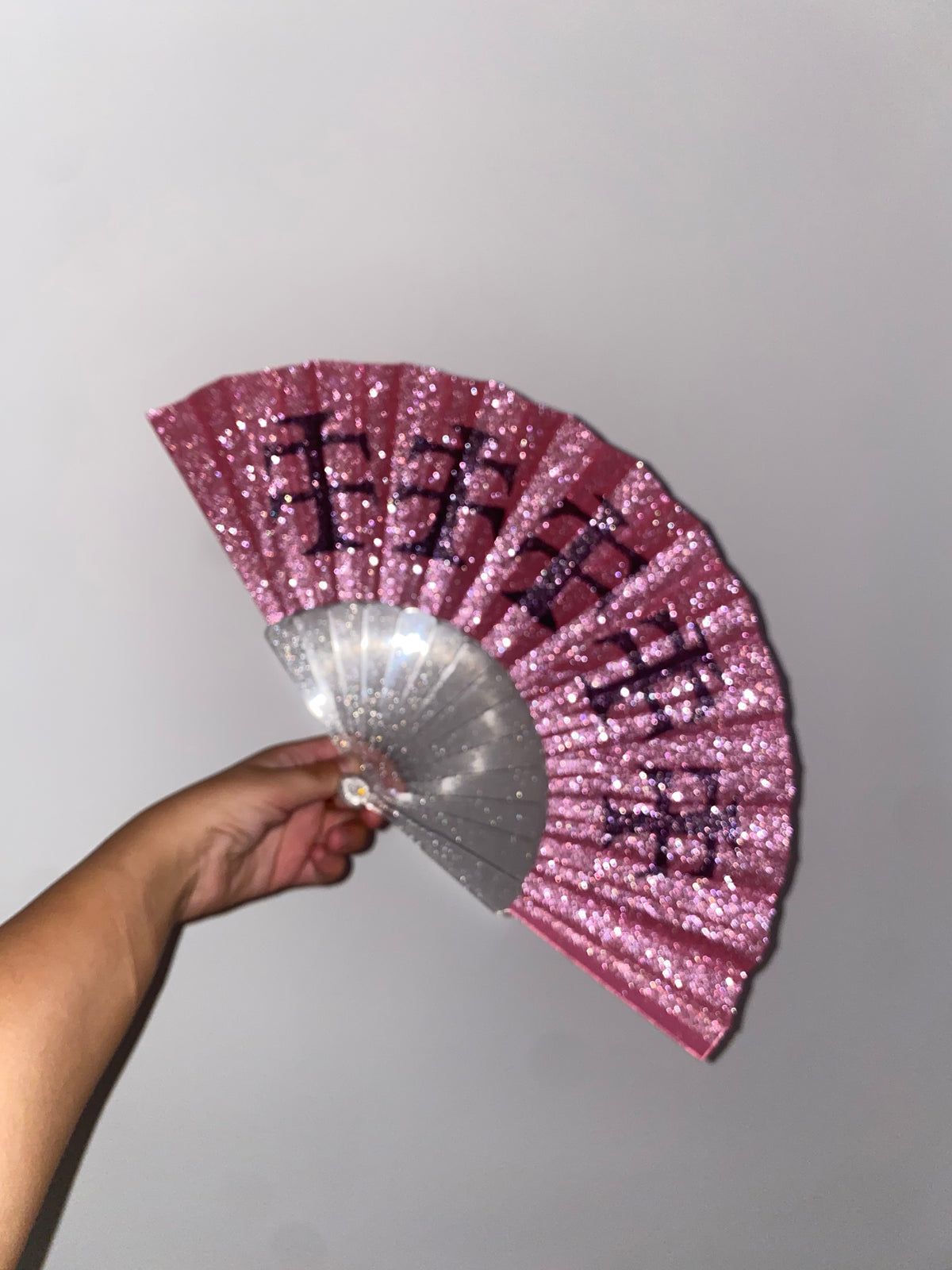 Pink glitter fan black cross