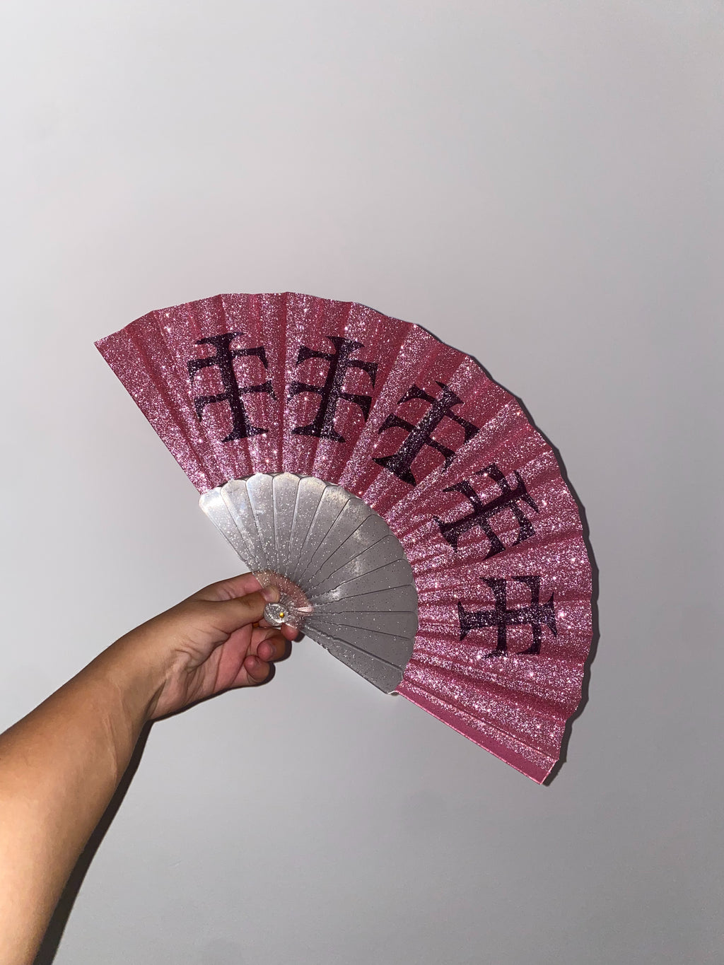 Pink glitter fan black cross